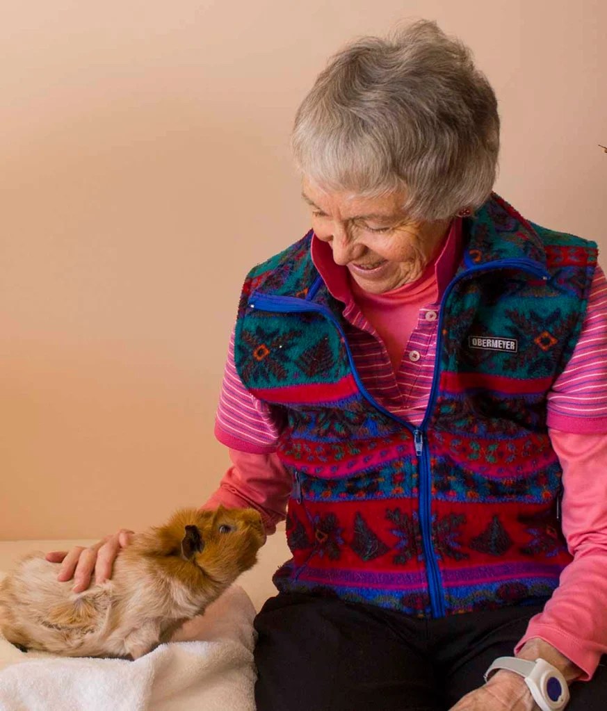Rochelle Perucca, Author, and Feather, the guinea pig. 